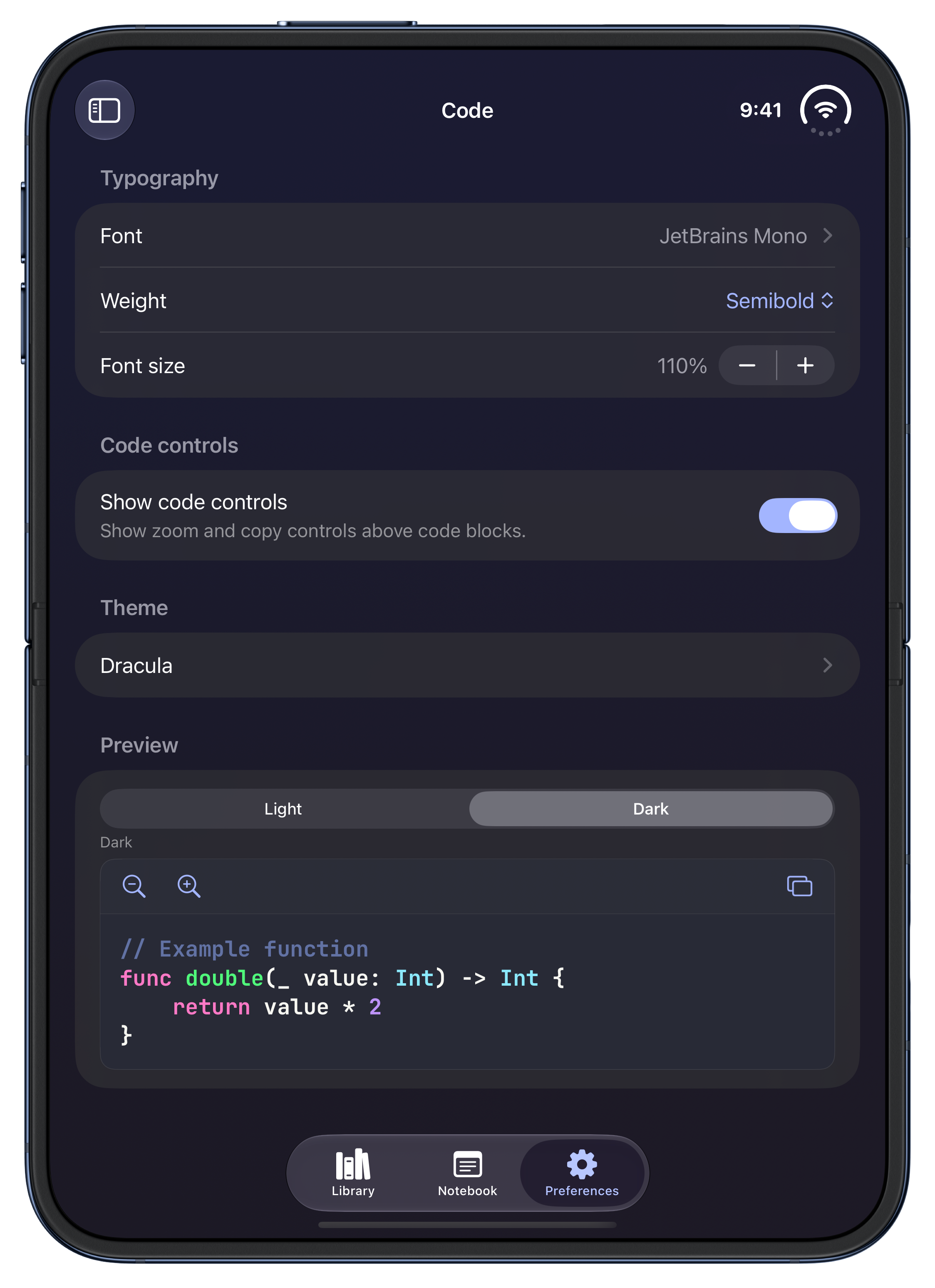Whio code preferences on an open iPhone Duo in dark appearance, showing the JetBrains Mono font, semibold weight, 110 percent font size, and a preview of highlighted code in the Dracula theme.
