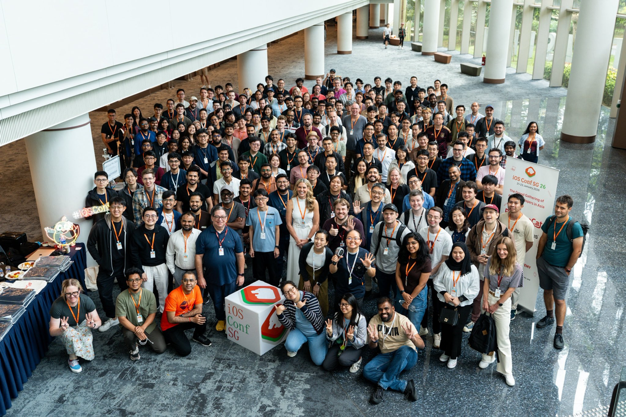 Group photo of speakers, organizers and attendees gathered at iOS Conf SG