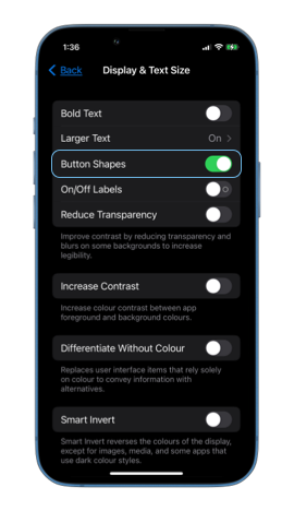 Screenshot of iPhone Display and Text accessibility settings with the Button Shapes toggle enabled
